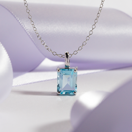 Blue Topaz Emerald Cut Pendant Necklace in Sterling Silver