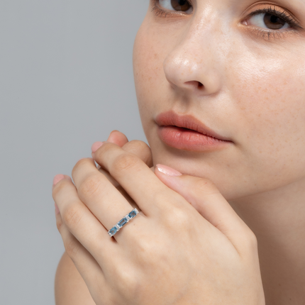 London Blue Topaz Emerald Cut Eternity Ring in Sterling Silver