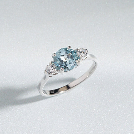 Blue Topaz Three Stone Ring in Sterling Silver