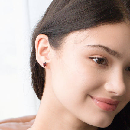 Garnet Oval Stud Earrings in Sterling Silver