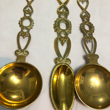 Collection of Eight Welsh Brass Love Spoons.