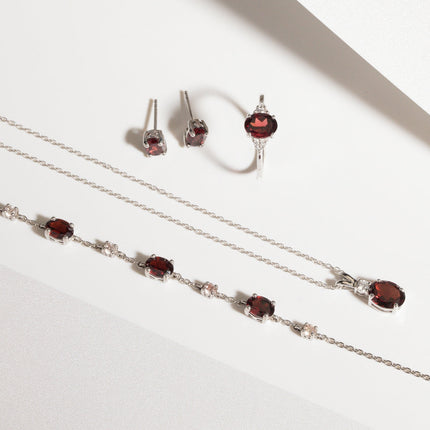 Garnet Oval Stud Earrings in Sterling Silver
